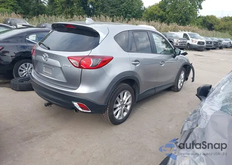 2015 Mazda Cx-5 Grand Touring z USA, uszkodzony, nr VIN JM3KE4DY7F0521993